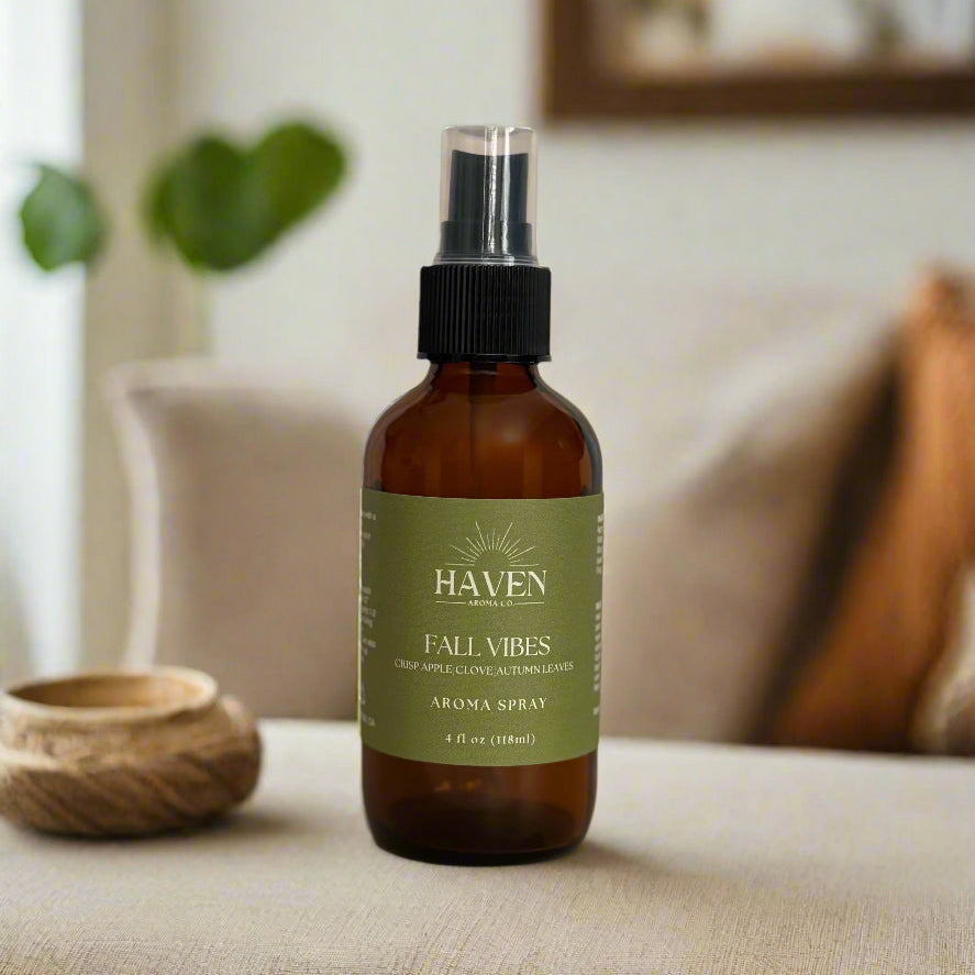 Brown spray bottle labeled 'Haven' with a green label on a beige background