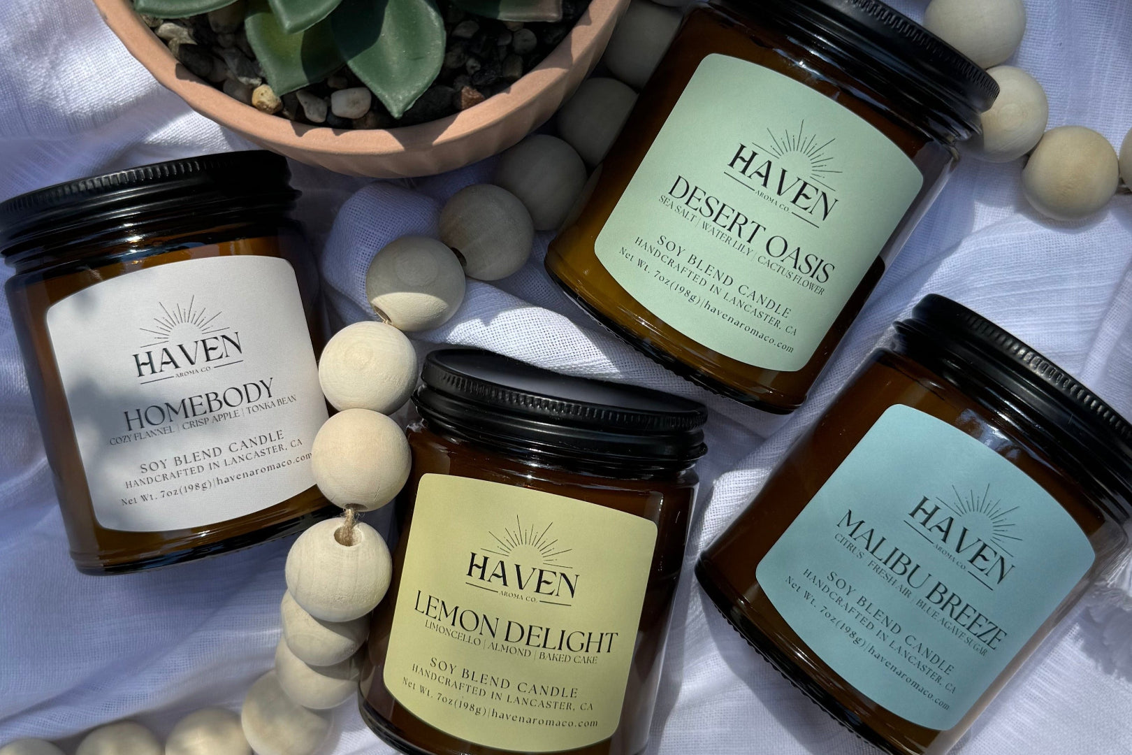 Pic of 4 Haven Aroma Co Signature Candles - Desert Oasis, Homebody, Lemon Delight, Malibu Breeze.