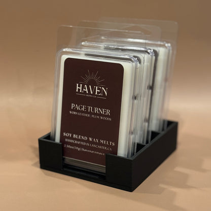 Packaged Haven Page Turner soy blend wax melts on a beige background