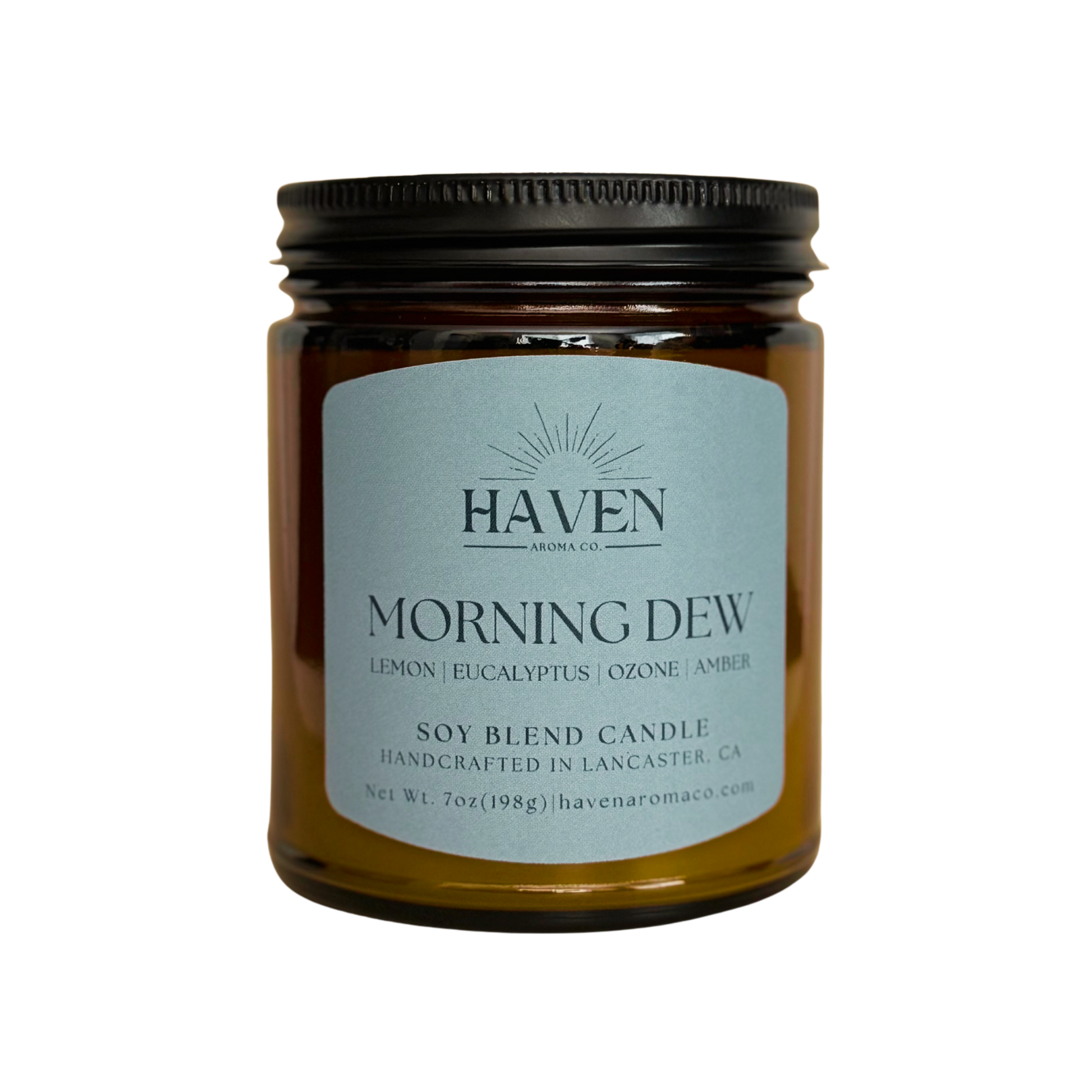 Haven Morning Dew candle in amber jar with black lid on white background